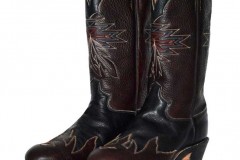 Black and brown cowboy boot with detailed toe fox and original Native American feather stitch pattern