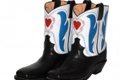Women's cowboy boots with black vamps, white tops, a red heart inlay and blue "wing" inlay